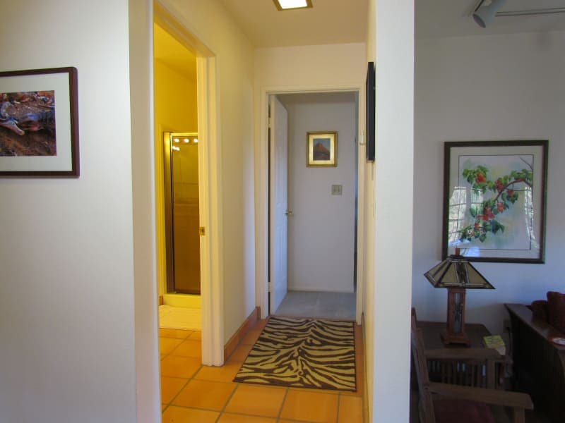 Me Tarzan, You Jane Room and bathroom doors and hallway