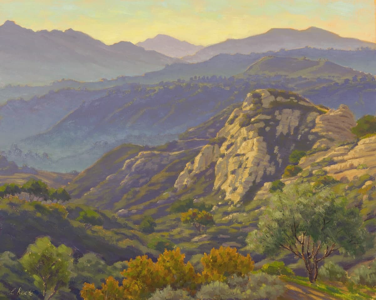 A serene landscape painting showcasing rolling hills, rocky formations, and trees under a soft, golden sunset.